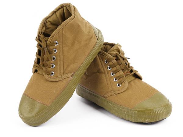 A pair of brown insulated cotton safety shoes