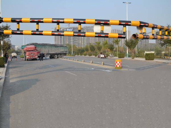 Reflective tape is pasted on the highway height limit and anti collision road blocker.